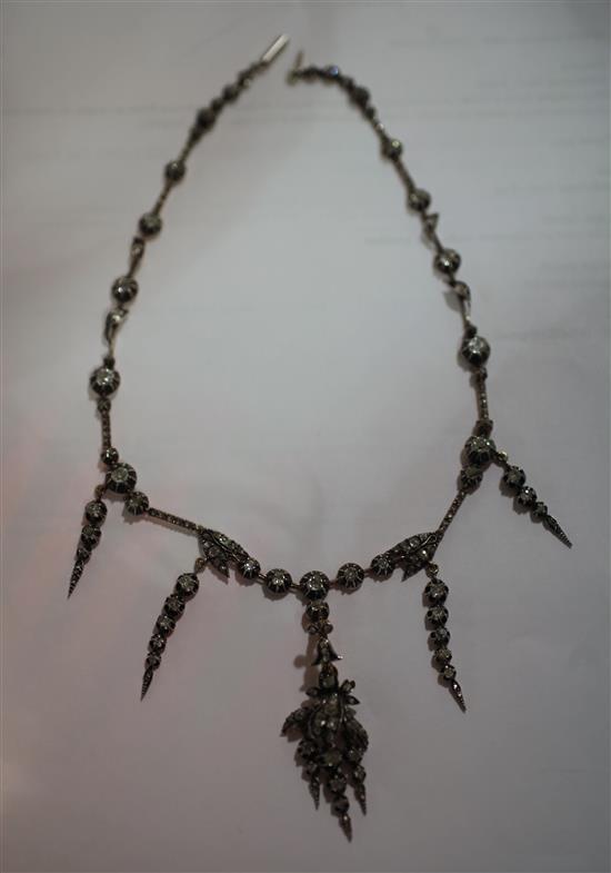 A 19th century French 18ct white gold and diamond drop pendant necklace, 15in.